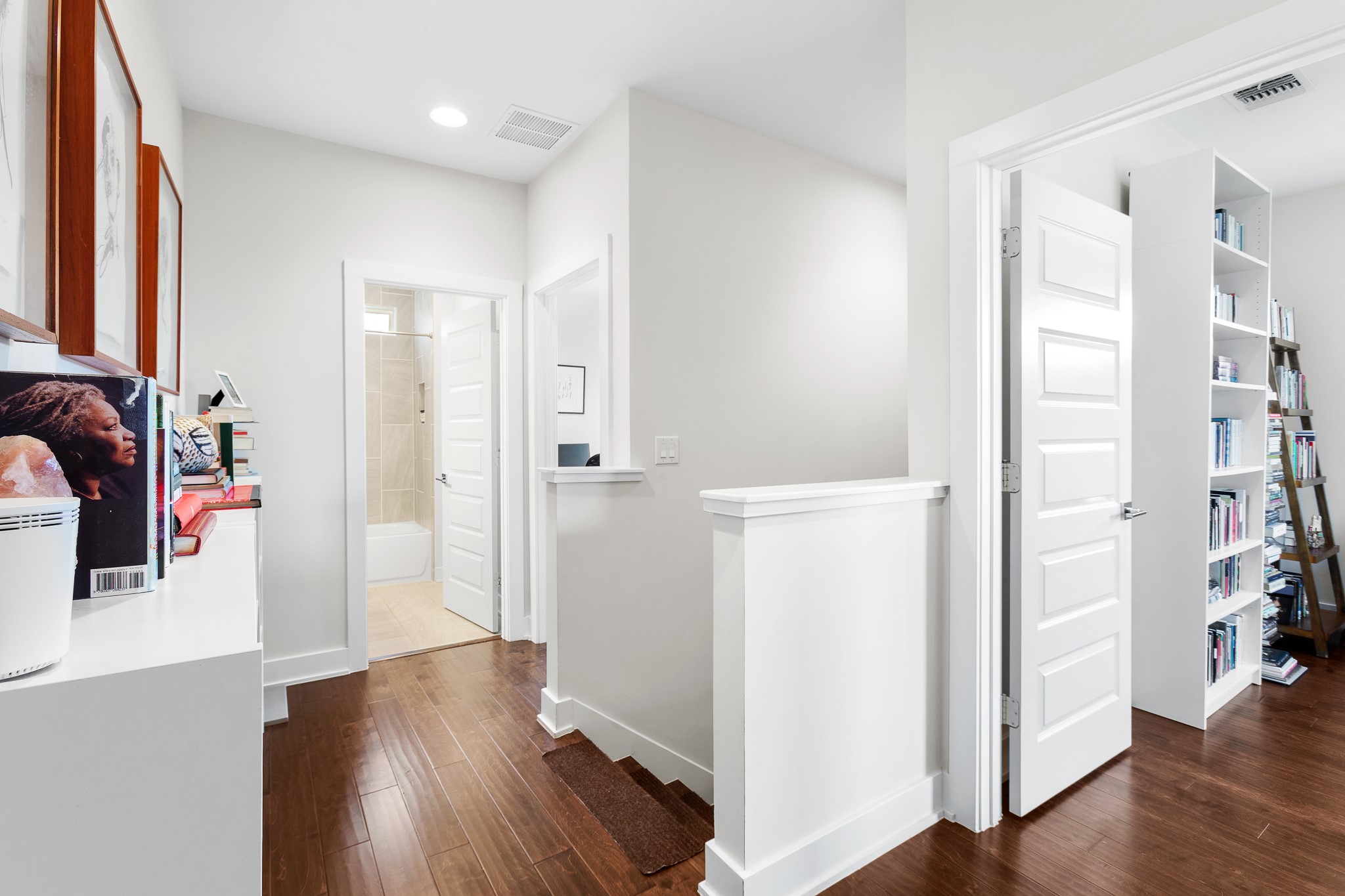 3101 Sunnylawn Circle, Unit B Austin, TX 78723 - Photo 21 of 32 Corridor with dark wood-style flooring, an upstairs landing, and recessed lighting