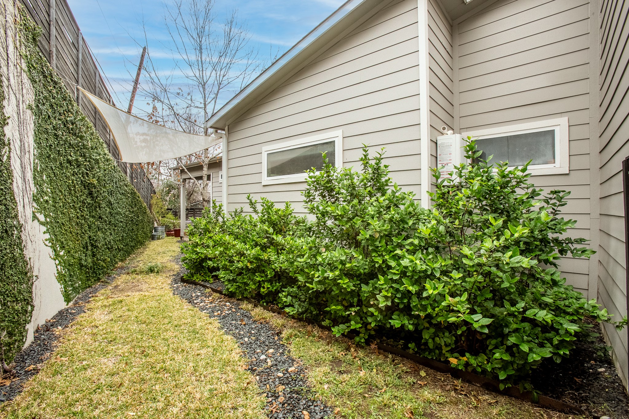 3101 Sunnylawn Circle, Unit B Austin, TX 78723 - Photo 25 of 32 View of side yard