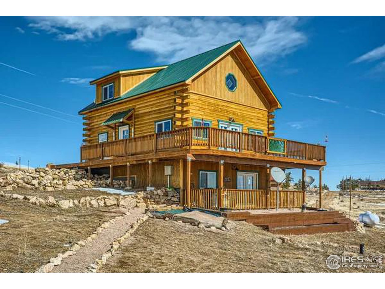37 Rabbit Ears Court Livermore, CO 80536 - Photo 2 of 37 Covered porch and deck.