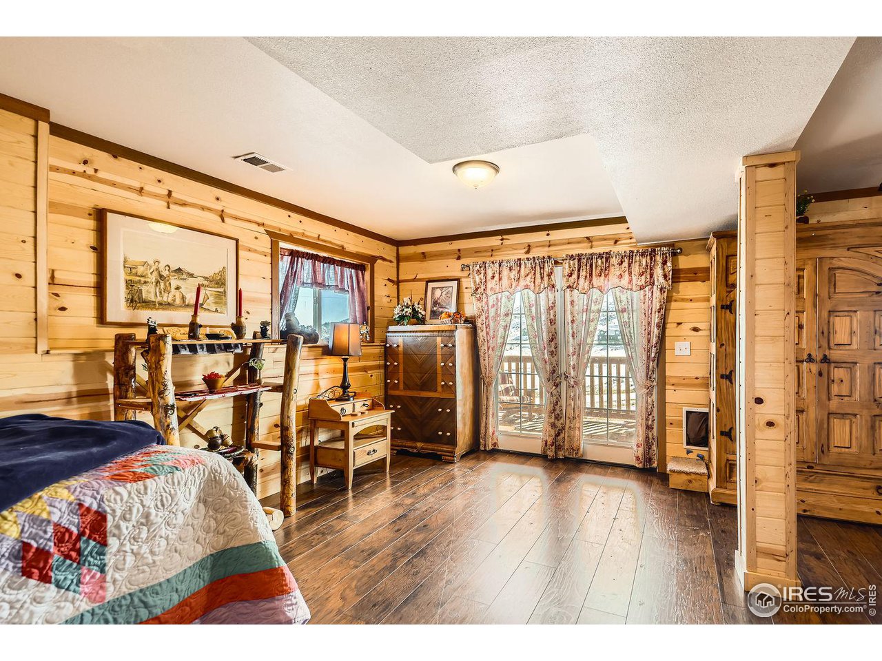 37 Rabbit Ears Court Livermore, CO 80536 - Photo 25 of 37 French doors out to covered porch