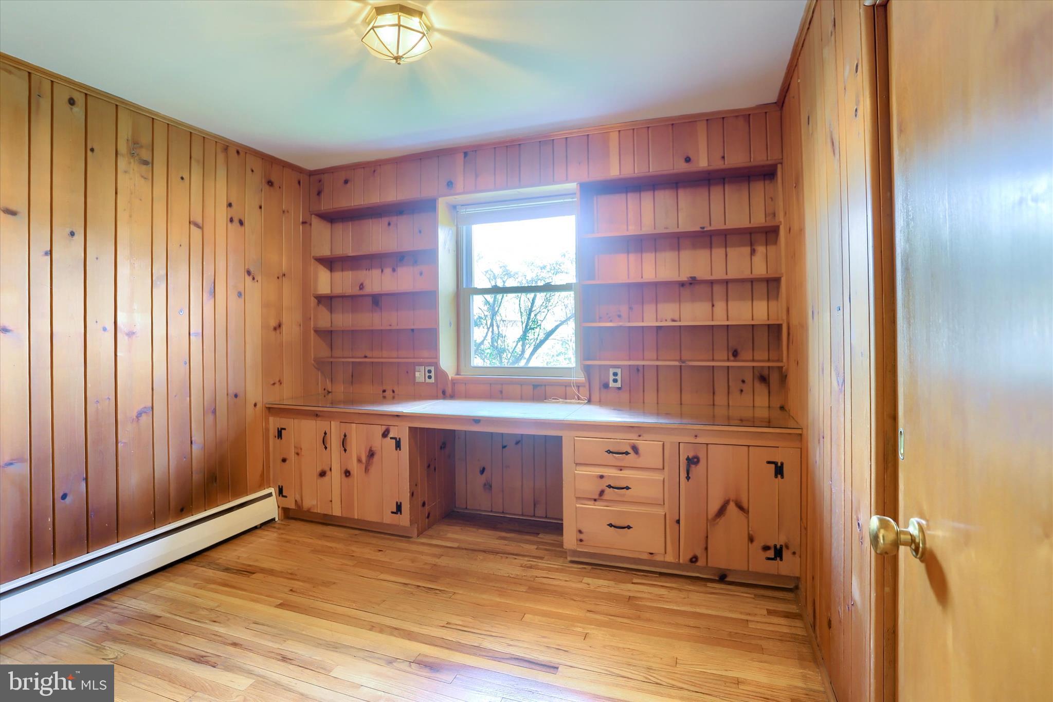 3802 Darby Road Harrisburg, PA 17109 - Photo 14 of 33 a view of a bedroom with a window and cabinet