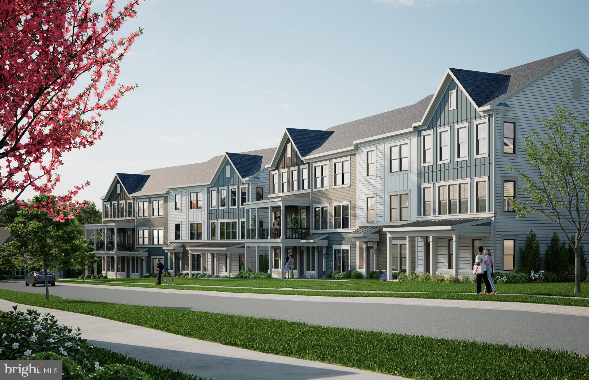 18315 Fox Xing Terrace Leesburg, VA 20176 - Photo 17 of 37 a front view of a residential apartment building with a yard