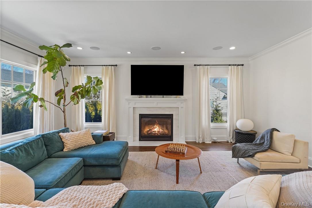 81 Spier Road Scarsdale, NY 10583 - Photo 6 of 32 Fabulous family room with gas fireplace