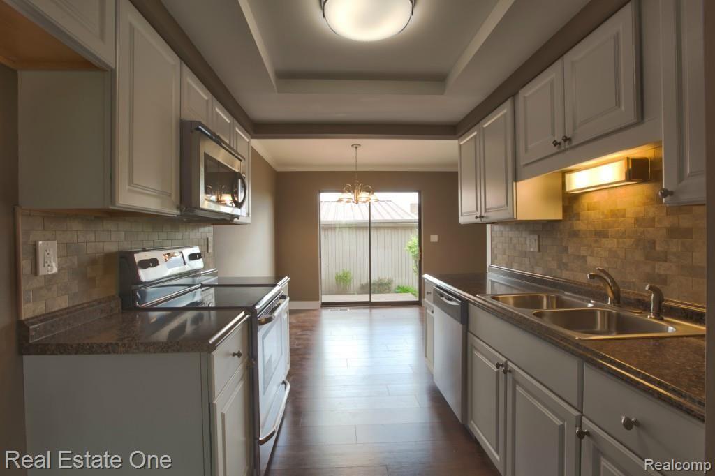 767 Oak Brook Ridge Drive, Unit 119 Rochester, MI 48307 - Photo 8 of 21 kitchen 1.jpg