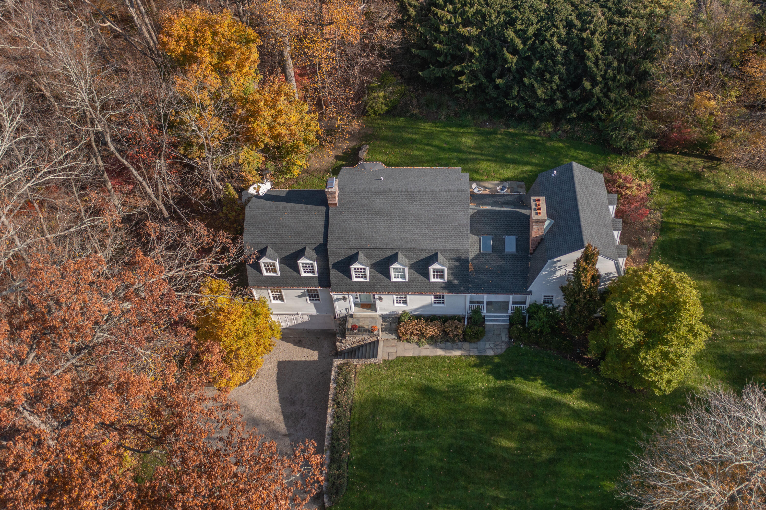 95 Ludlowe Road New Canaan, CT 06840 - Photo 2 of 37 an aerial view of a house with yard swimming pool and outdoor seating