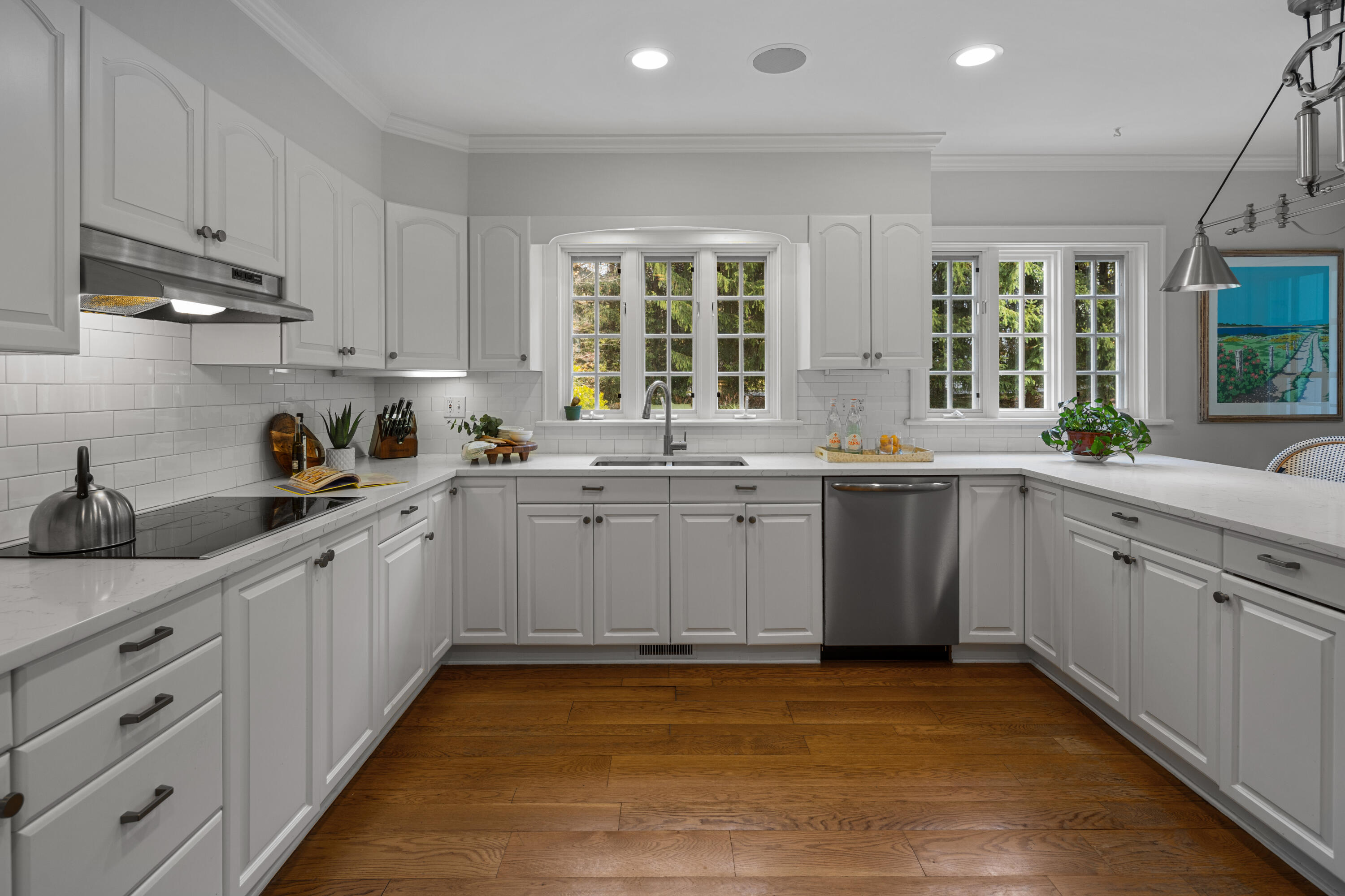 95 Ludlowe Road New Canaan, CT 06840 - Photo 11 of 37 a kitchen with a sink stove and cabinets