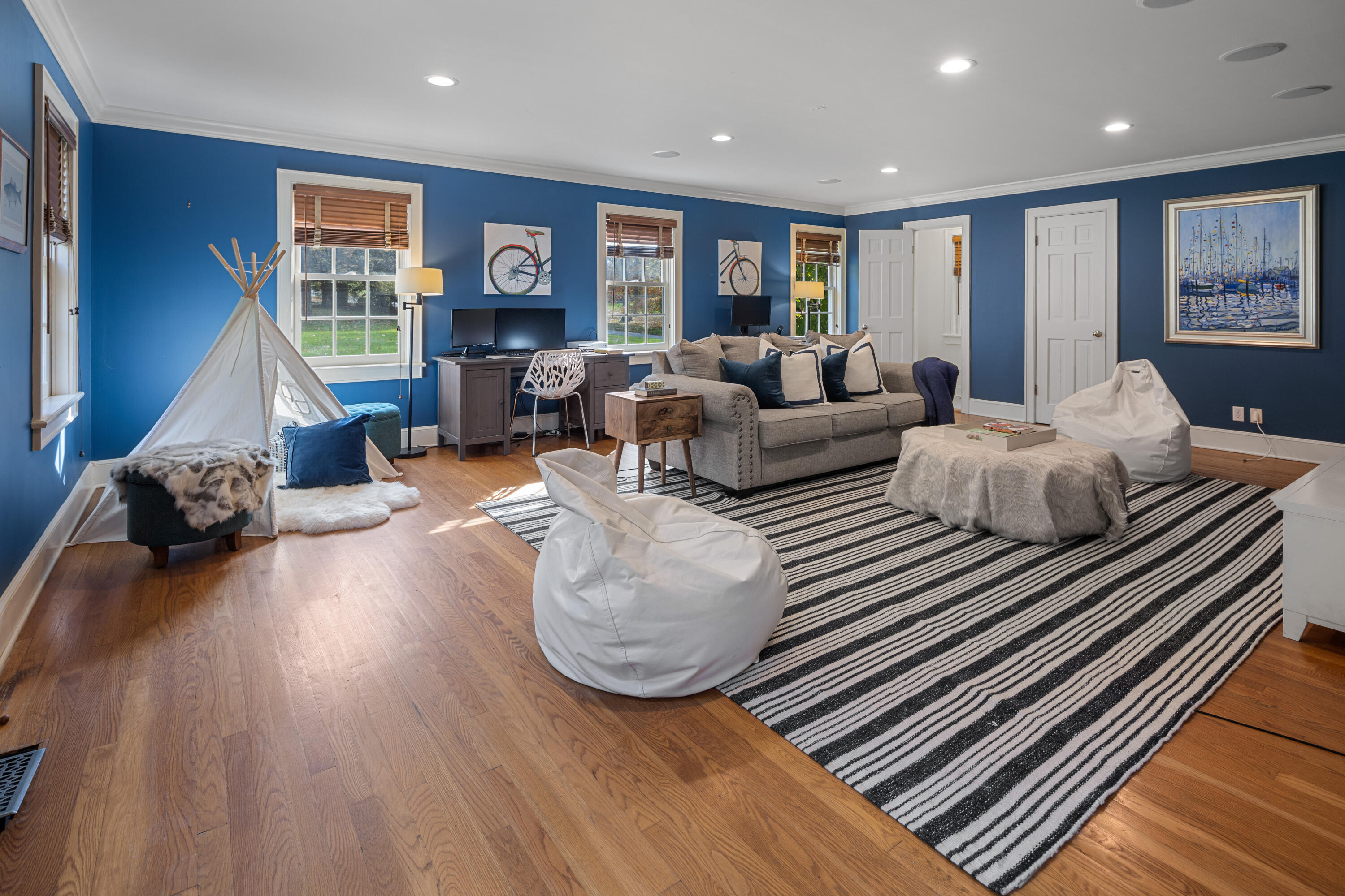 95 Ludlowe Road New Canaan, CT 06840 - Photo 13 of 37 a living room with furniture and a fireplace