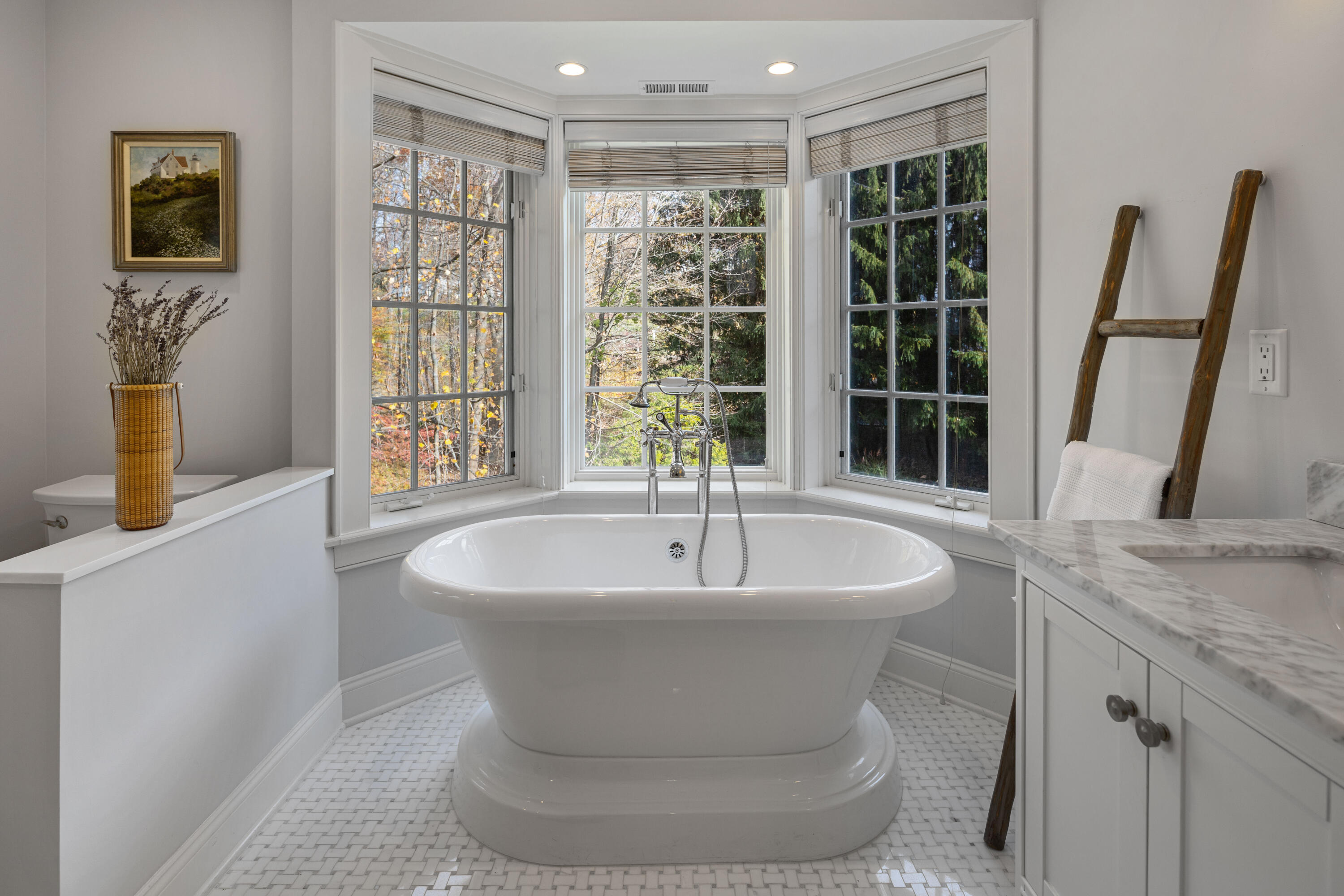 95 Ludlowe Road New Canaan, CT 06840 - Photo 19 of 37 a spacious bathroom with a sink and a bathtub