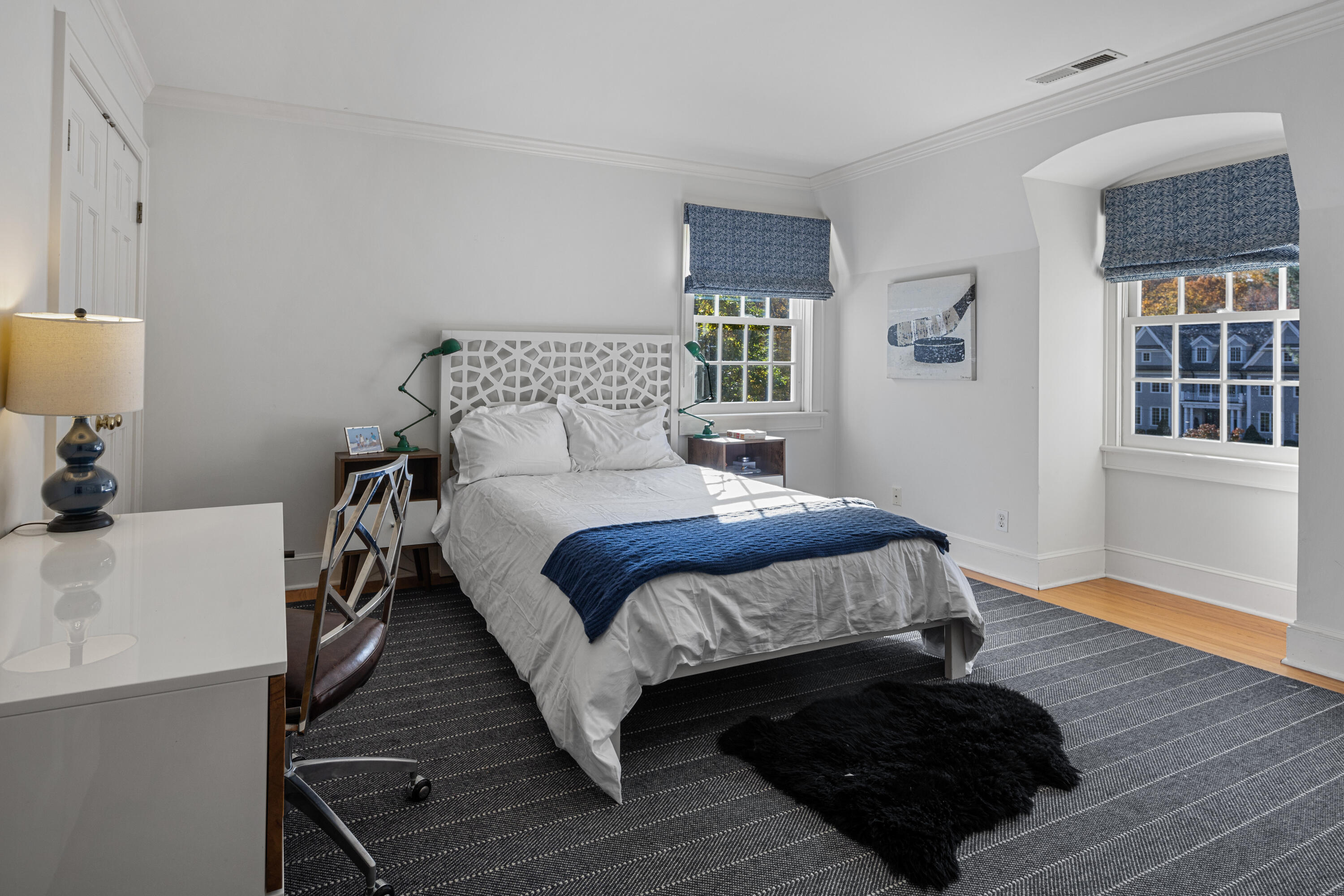 95 Ludlowe Road New Canaan, CT 06840 - Photo 22 of 37 a bedroom with a bed wooden floor and window