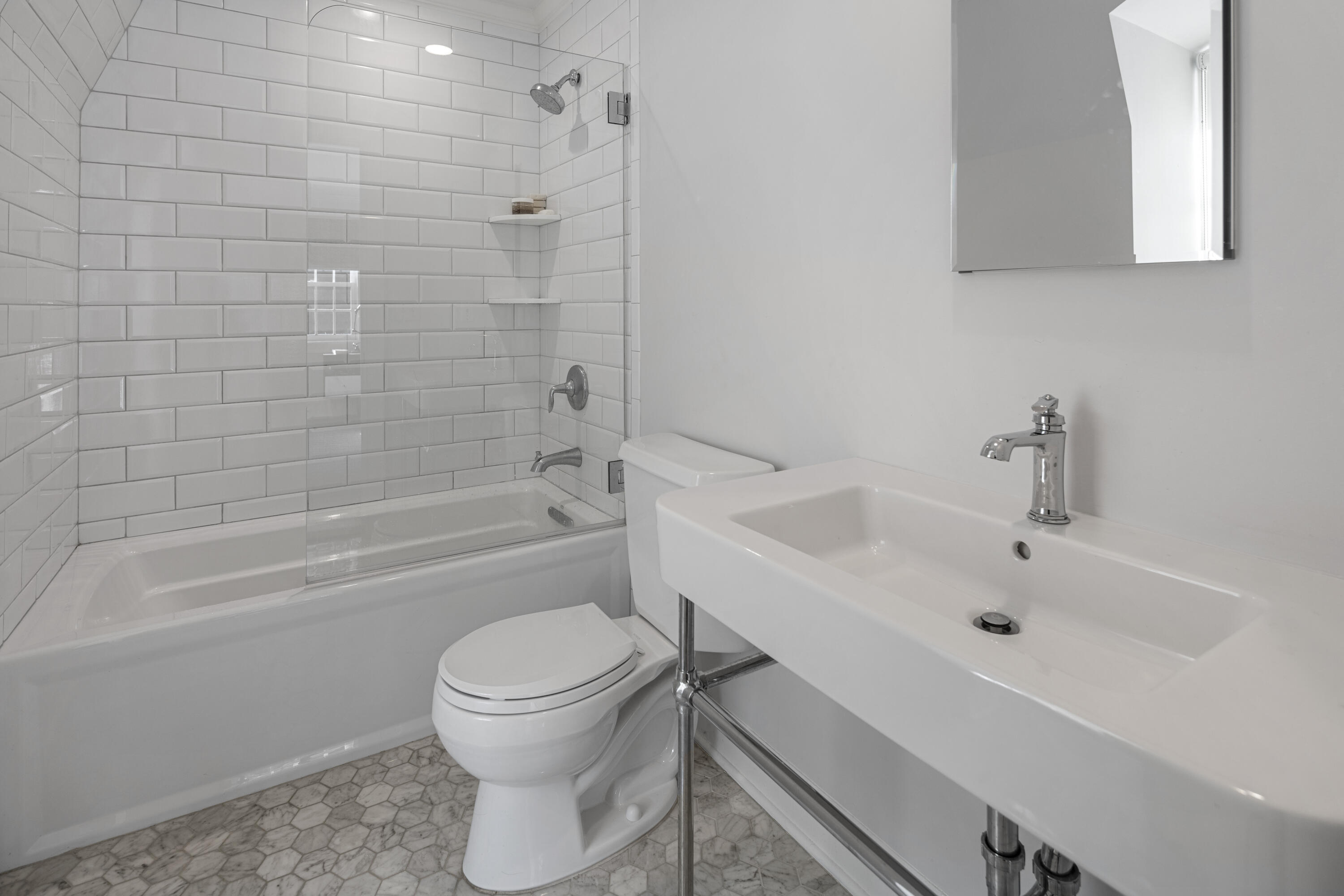 95 Ludlowe Road New Canaan, CT 06840 - Photo 23 of 37 a bathroom with a sink a toilet and a bathtub