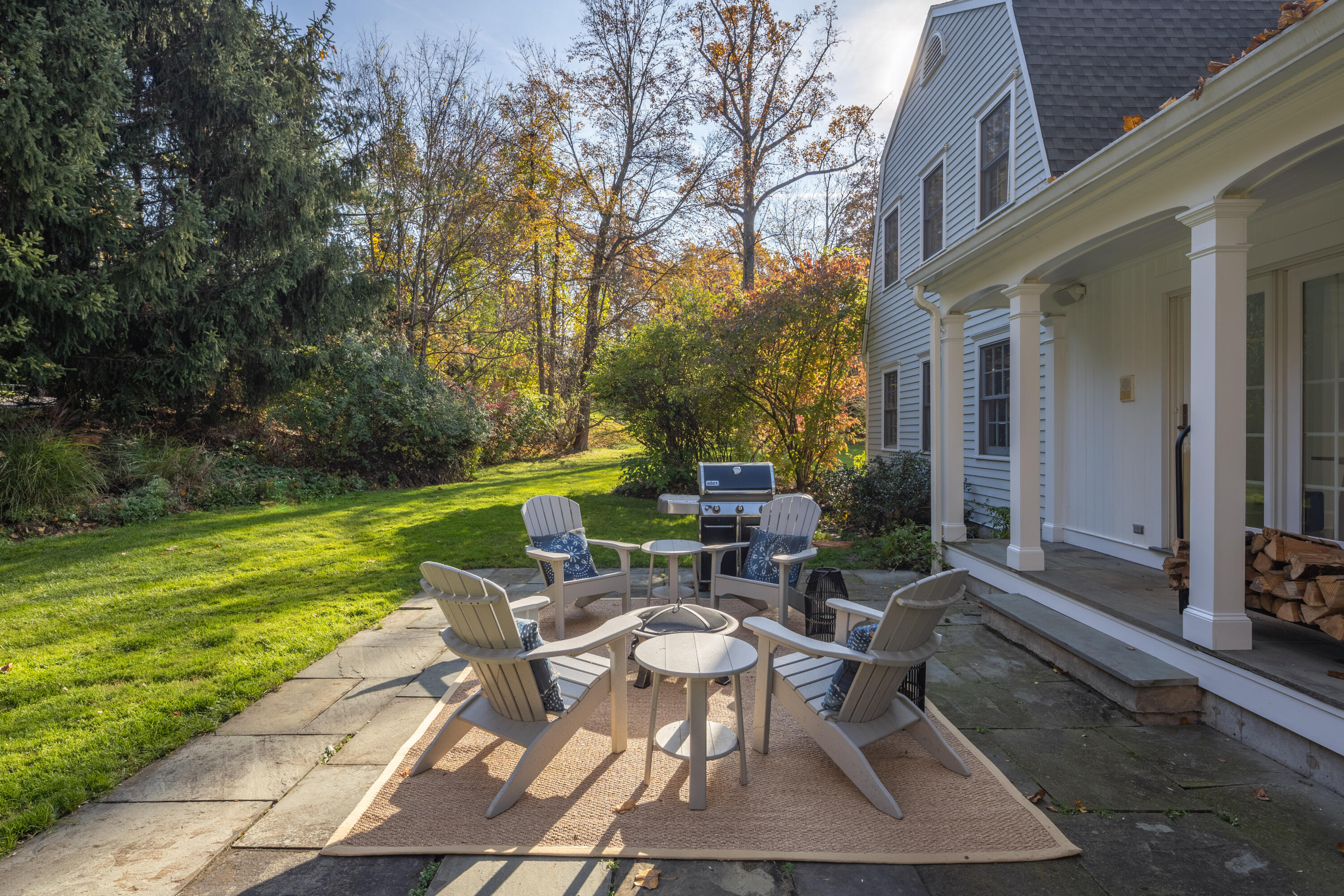 95 Ludlowe Road New Canaan, CT 06840 - Photo 30 of 37 a view of a patio with table and chairs and potted plants