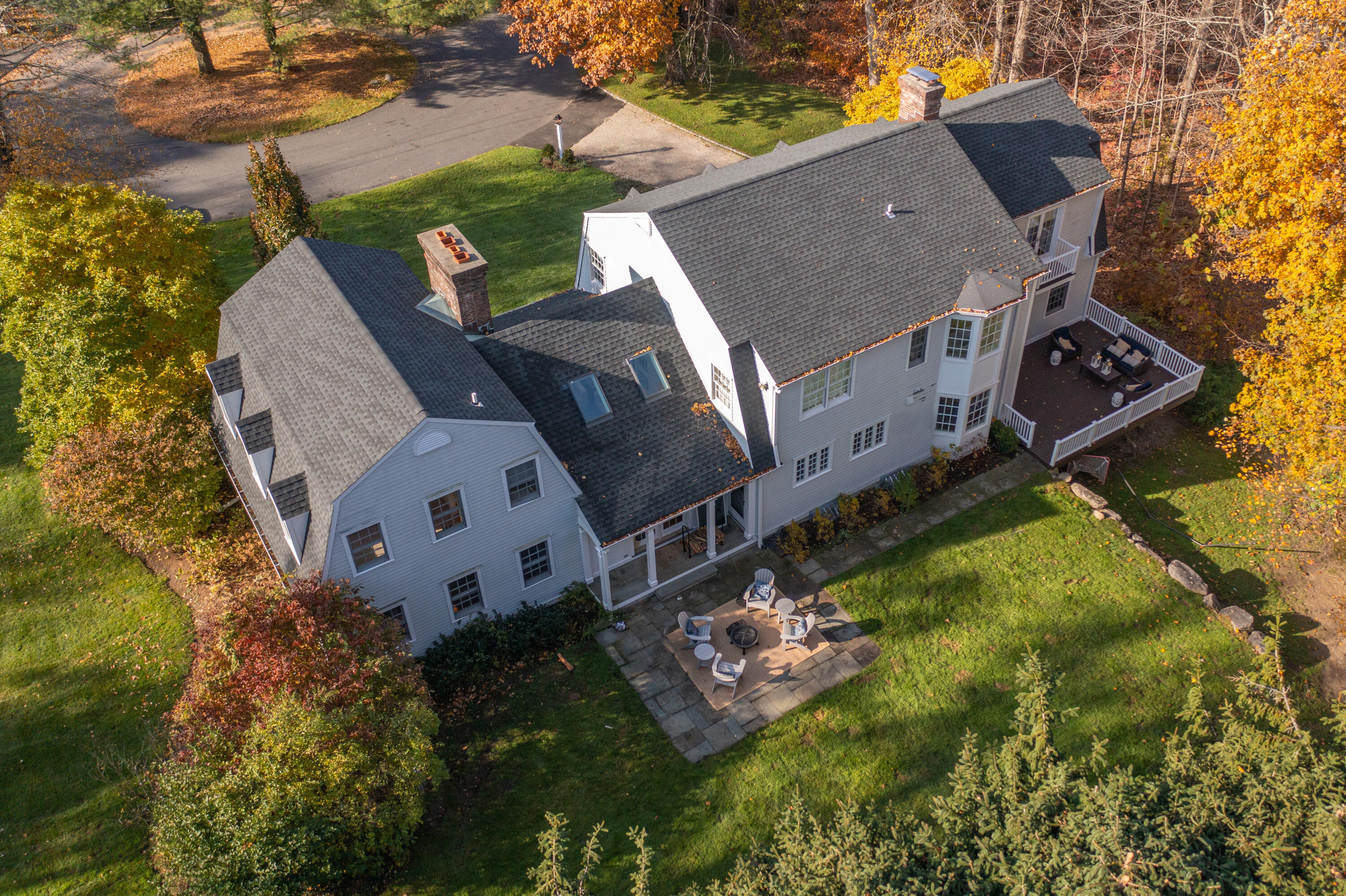 95 Ludlowe Road New Canaan, CT 06840 - Photo 32 of 37 a view of a house with a yard and garden