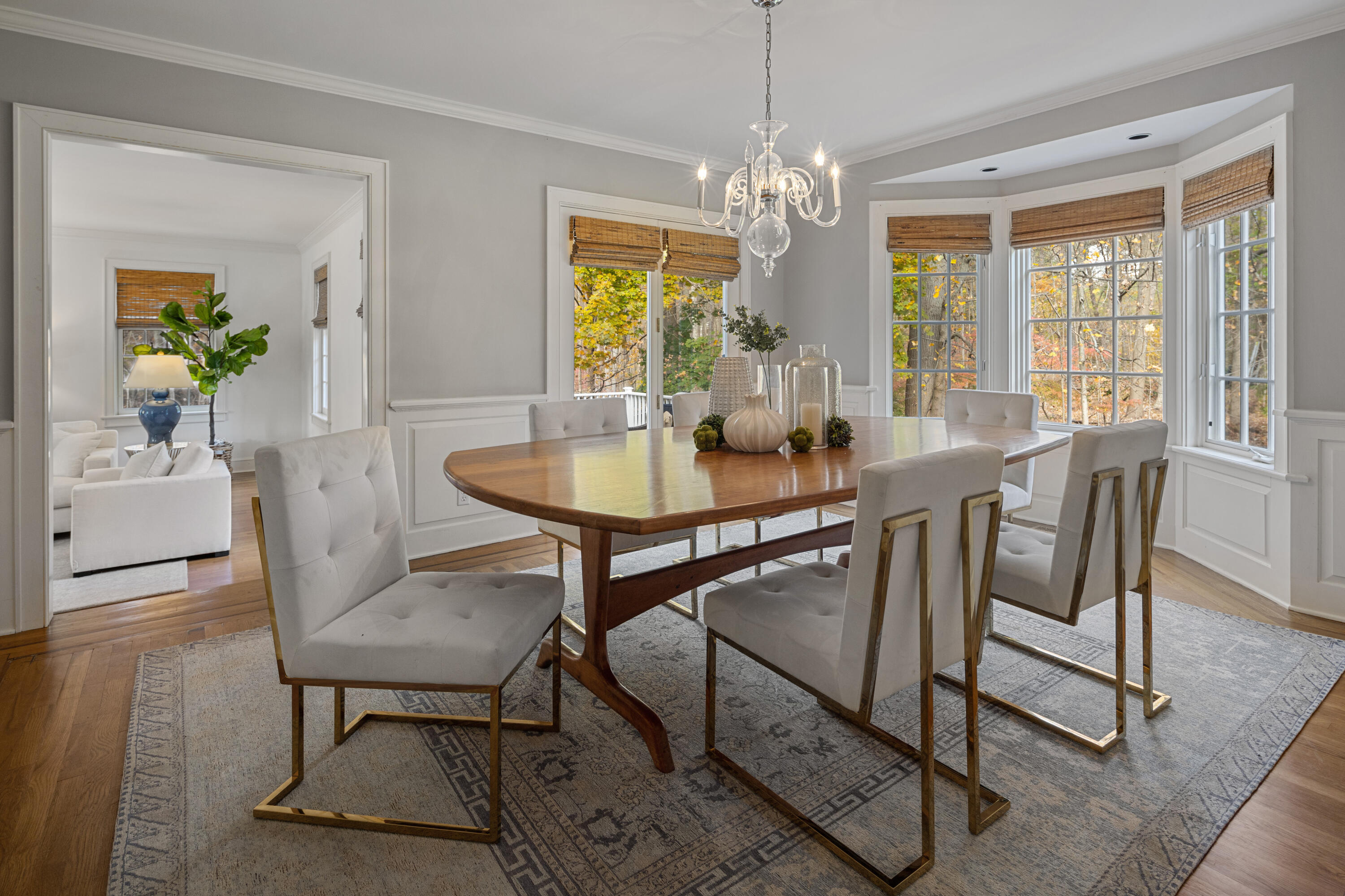 95 Ludlowe Road New Canaan, CT 06840 - Photo 9 of 37 a view of a dining room with furniture and chandelier