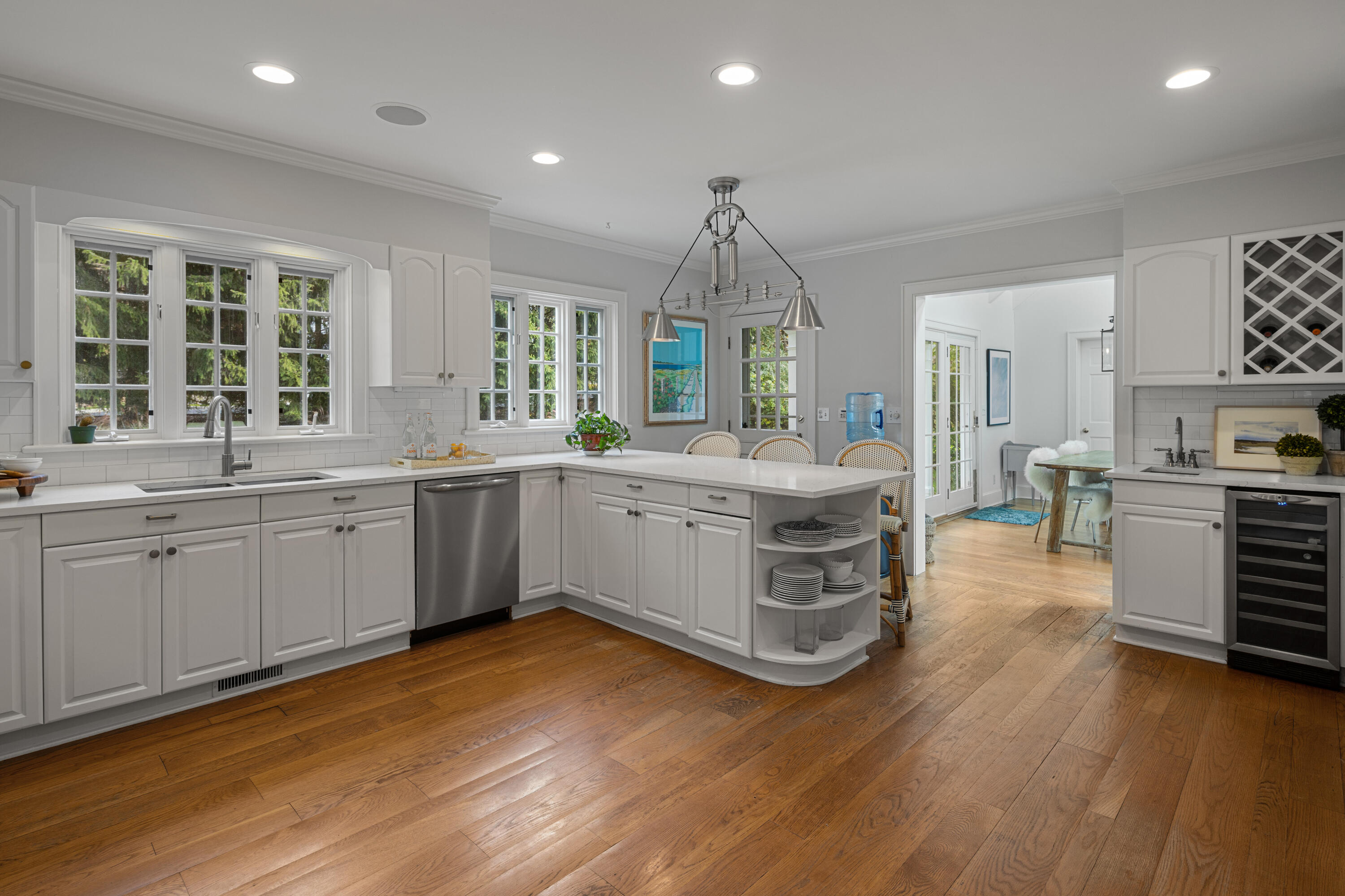 95 Ludlowe Road New Canaan, CT 06840 - Photo 10 of 37 a kitchen with a sink cabinets and wooden floor