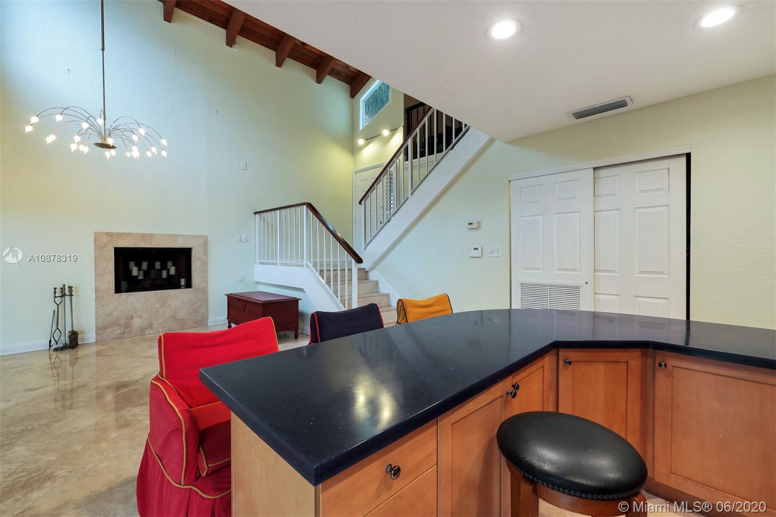 74 Ivy Road Hollywood, FL 33021 - Photo 11 of 55 a living room with furniture and a wooden floor