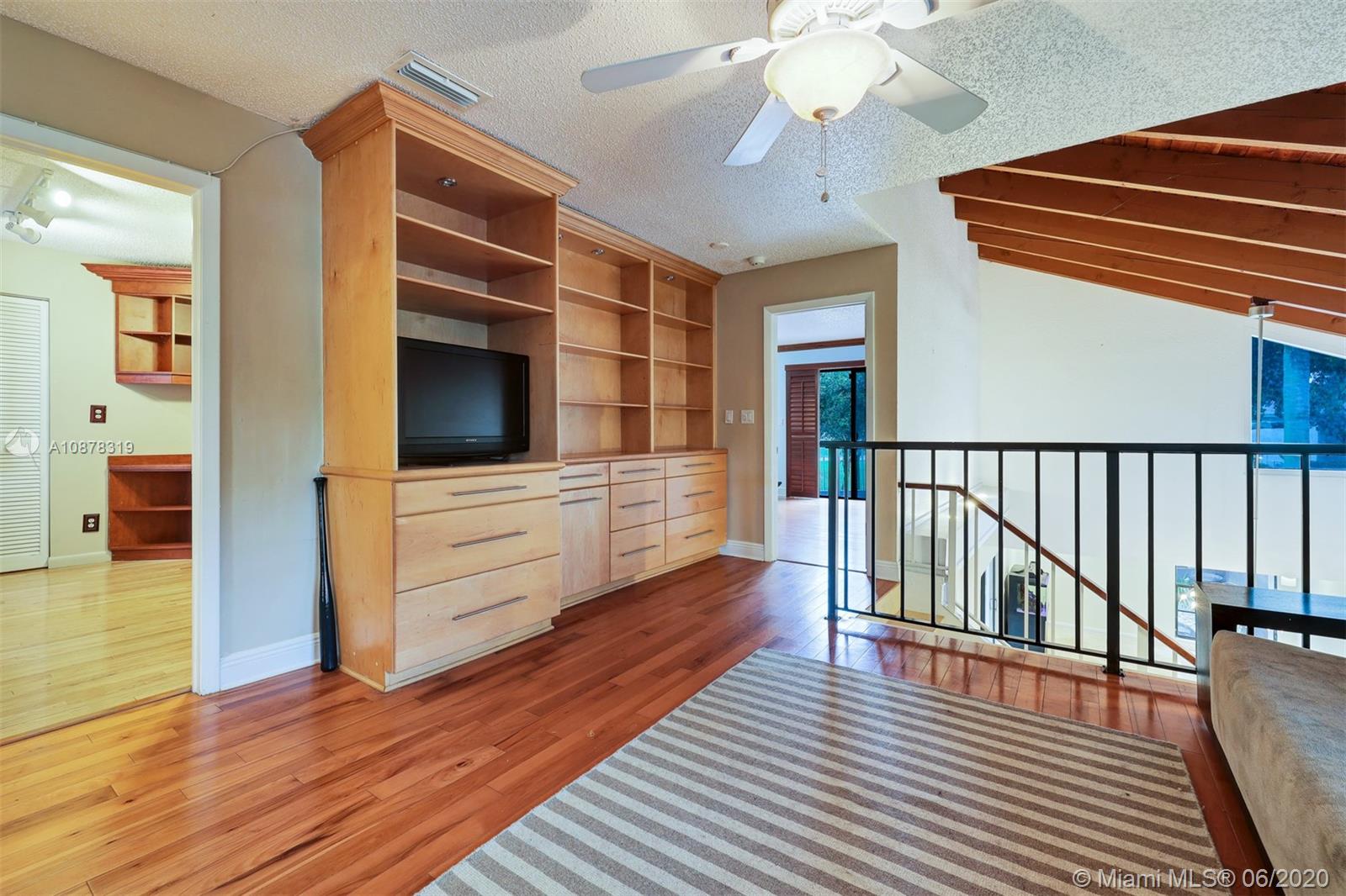 74 Ivy Road Hollywood, FL 33021 - Photo 33 of 55 wooden floor in an empty room with a window and wooden floor