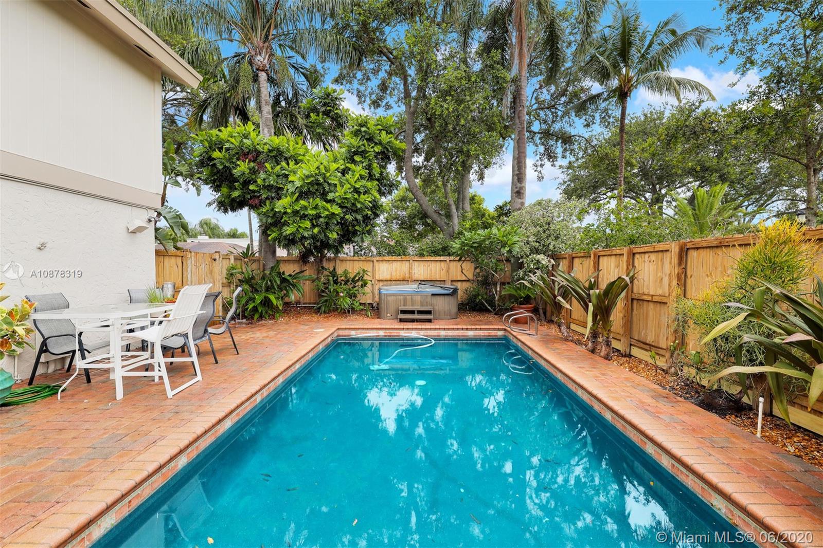 74 Ivy Road Hollywood, FL 33021 - Photo 44 of 55 a view of swimming pool with chairs