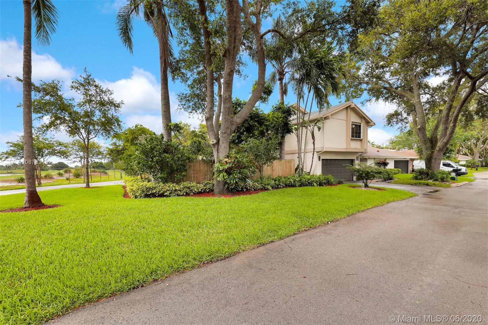 74 Ivy Road Hollywood, FL 33021 - Photo 49 of 55 a view of a house with a park