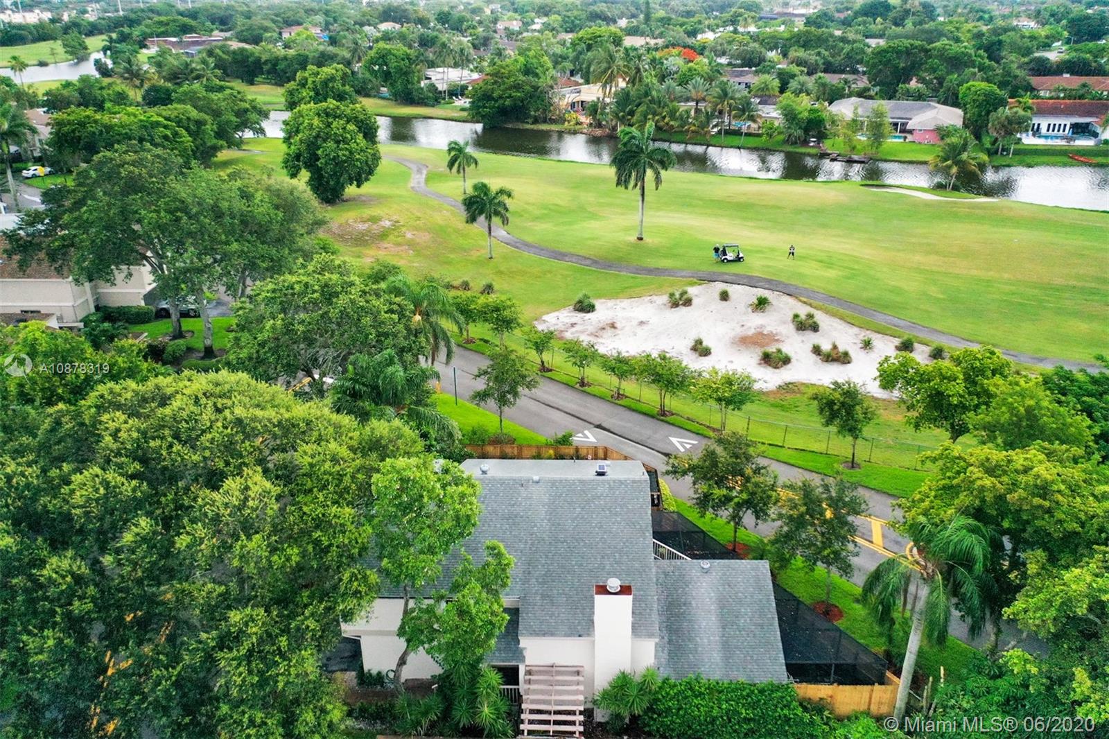 74 Ivy Road Hollywood, FL 33021 - Photo 54 of 55 an aerial view of a houses with outdoor space and street view