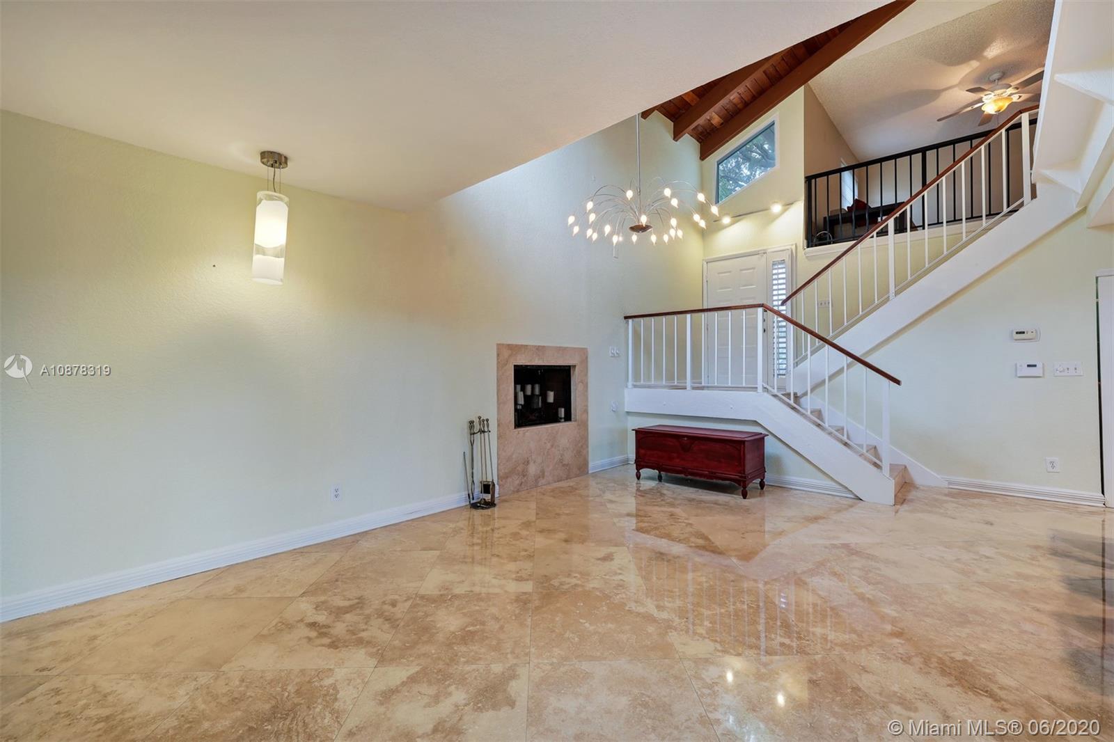 74 Ivy Road Hollywood, FL 33021 - Photo 6 of 55 a view of entryway bedroom and hall with wooden floor