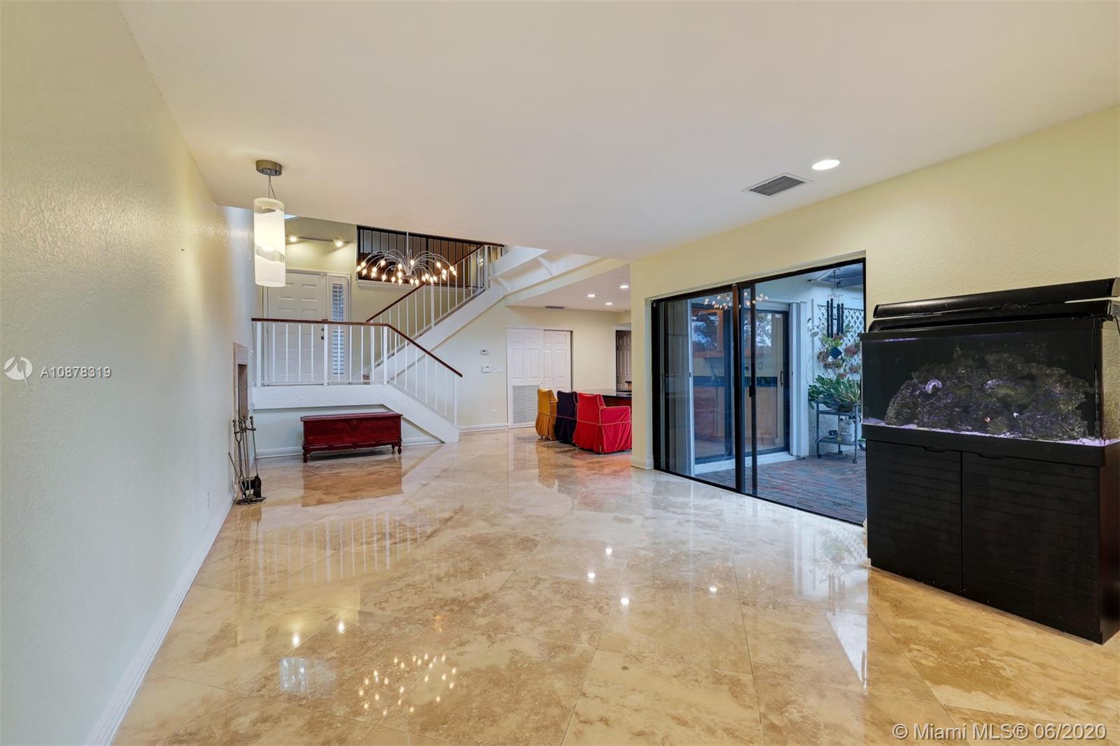 74 Ivy Road Hollywood, FL 33021 - Photo 8 of 55 a living room with furniture and kitchen view