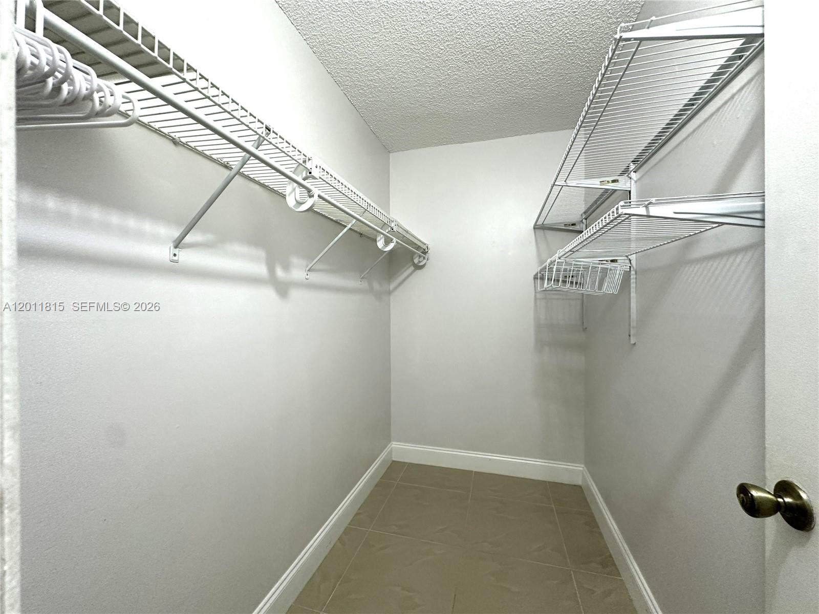 9370 Southwest 8th Street, Unit 107 Boca Raton, FL 33428 - Photo 6 of 17 a view of walk in closet