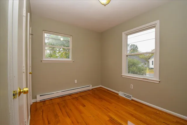 a view of an empty room and window