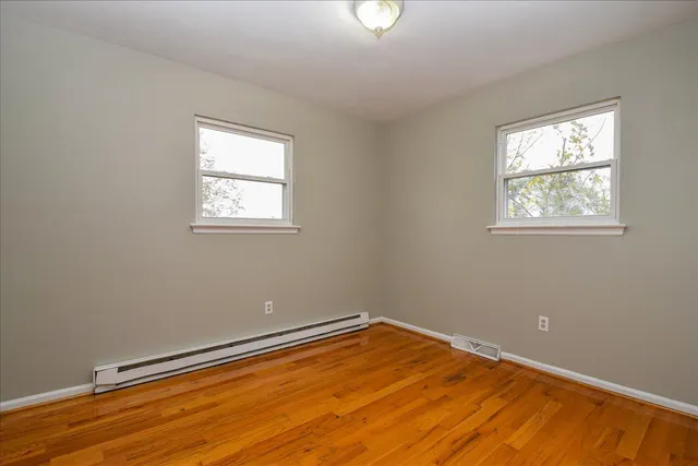 a view of a room with a window