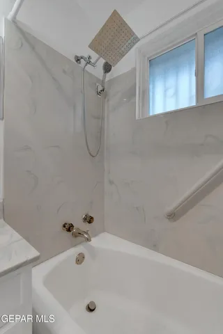 a bathroom with a tub
