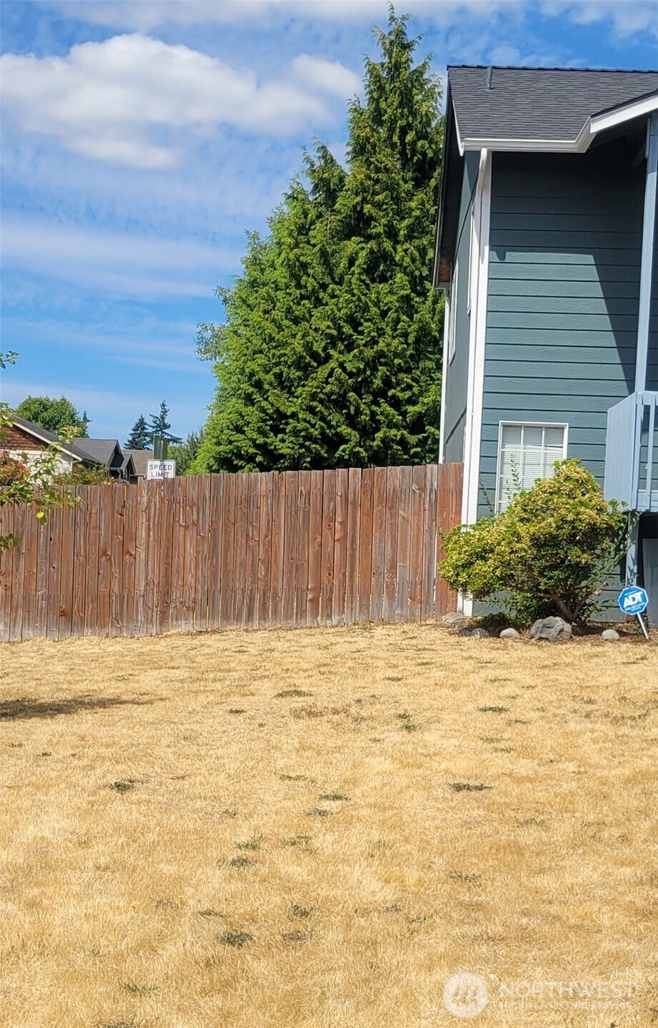 Undisclosed Address Everett, WA 98208 - Photo 2 of 2 a view of wooden fence and a yard