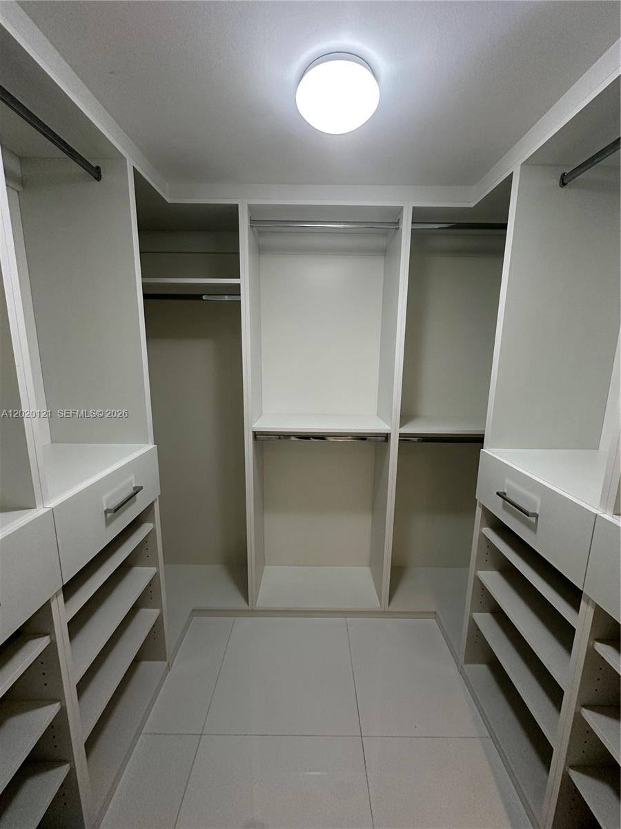 2101 Brickell Avenue, Unit 1909 Miami, FL 33129 - Photo 24 of 25 walk in closet