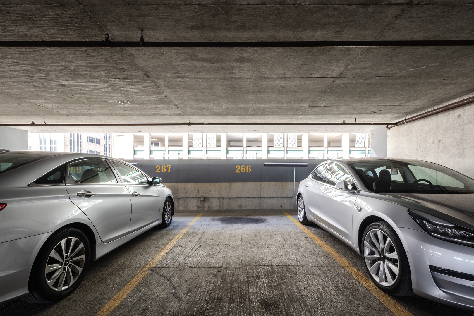 235 West Van Buren Street, Unit 3105 Chicago, IL 60607 - Photo 28 of 29 a view of parking garage with cars parked