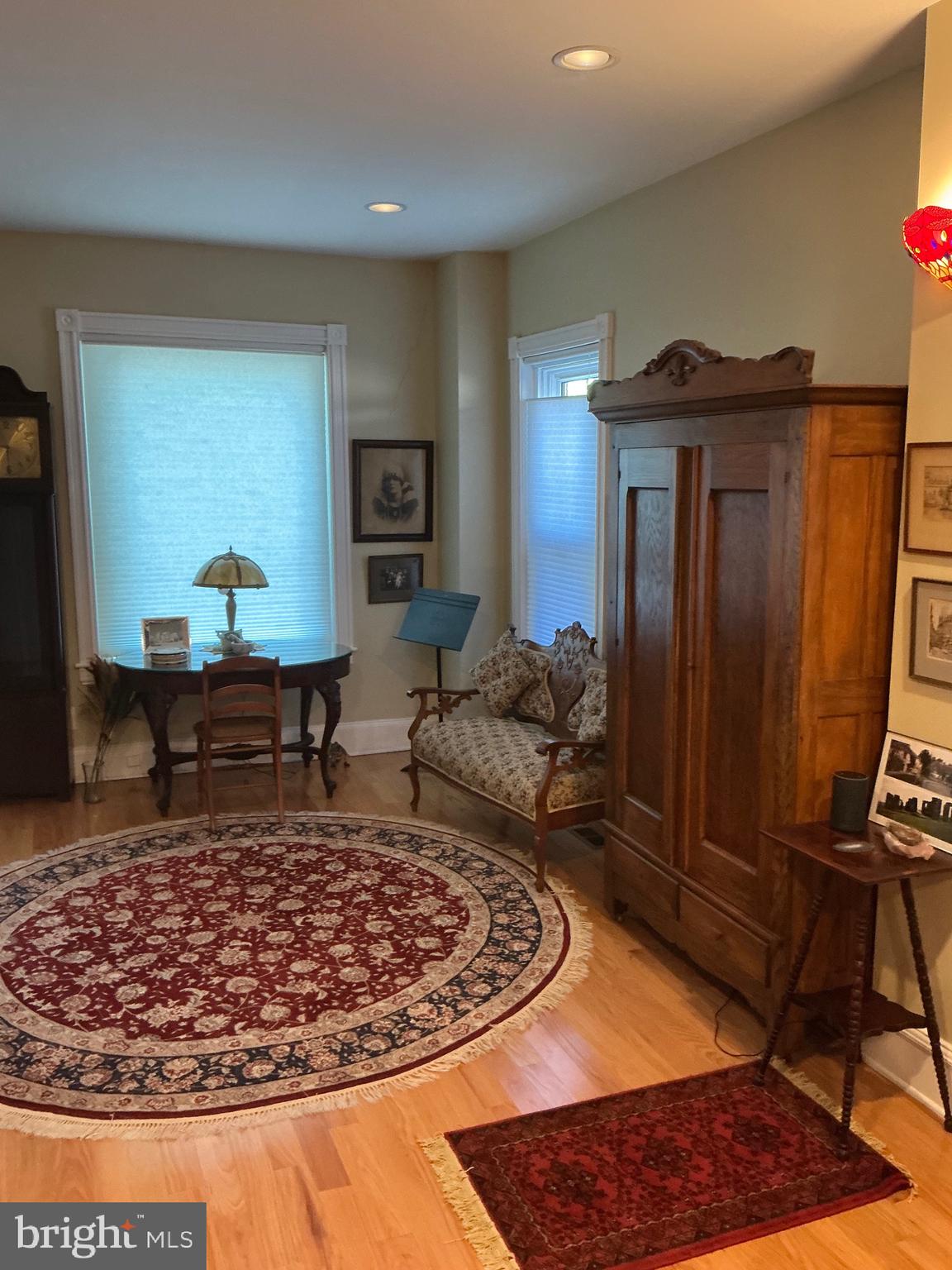 29 Centre Street Haddonfield, NJ 08033 - Photo 5 of 39 a living room with a couch and a rug