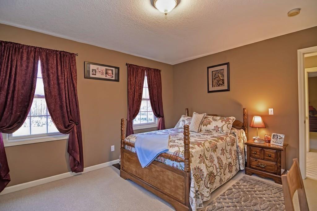 774 Reed Street Warren, MA 01092 - Photo 30 of 42 a bedroom with a bed and a window