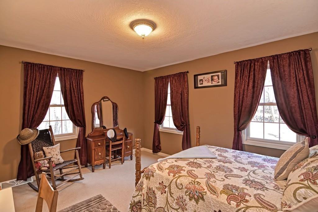 774 Reed Street Warren, MA 01092 - Photo 31 of 42 a bedroom with a bed and a window