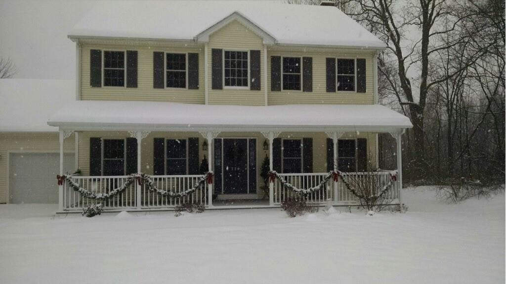 774 Reed Street Warren, MA 01092 - Photo 42 of 42 a view of a house with a yard and sitting area