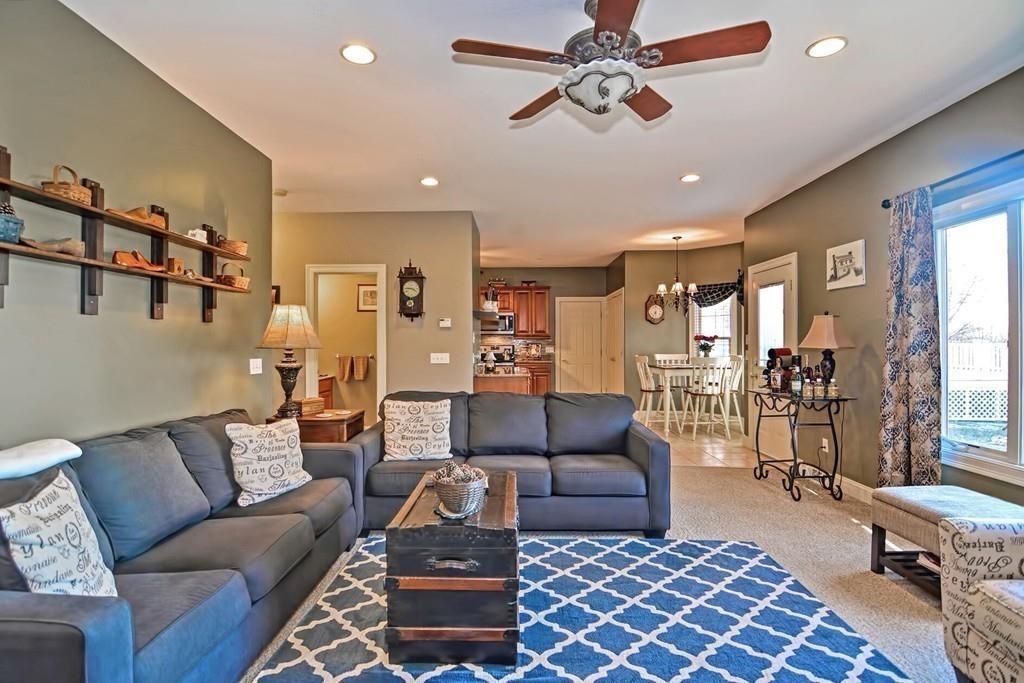 774 Reed Street Warren, MA 01092 - Photo 7 of 42 a living room with furniture a ceiling fan and a rug