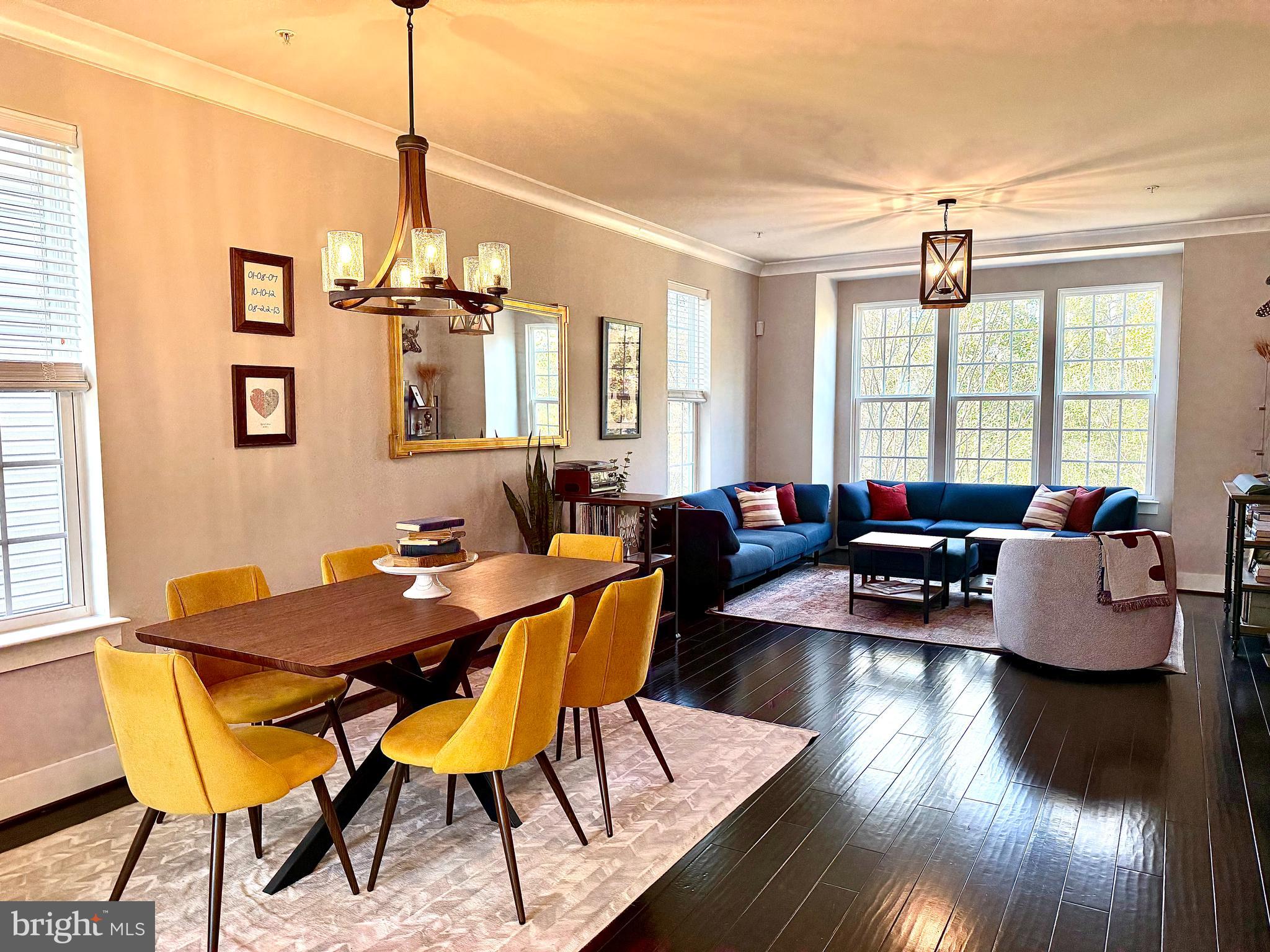 120 Waterline Court Annapolis, MD 21401 - Photo 13 of 38 a view of a dining room with furniture window and wooden floor