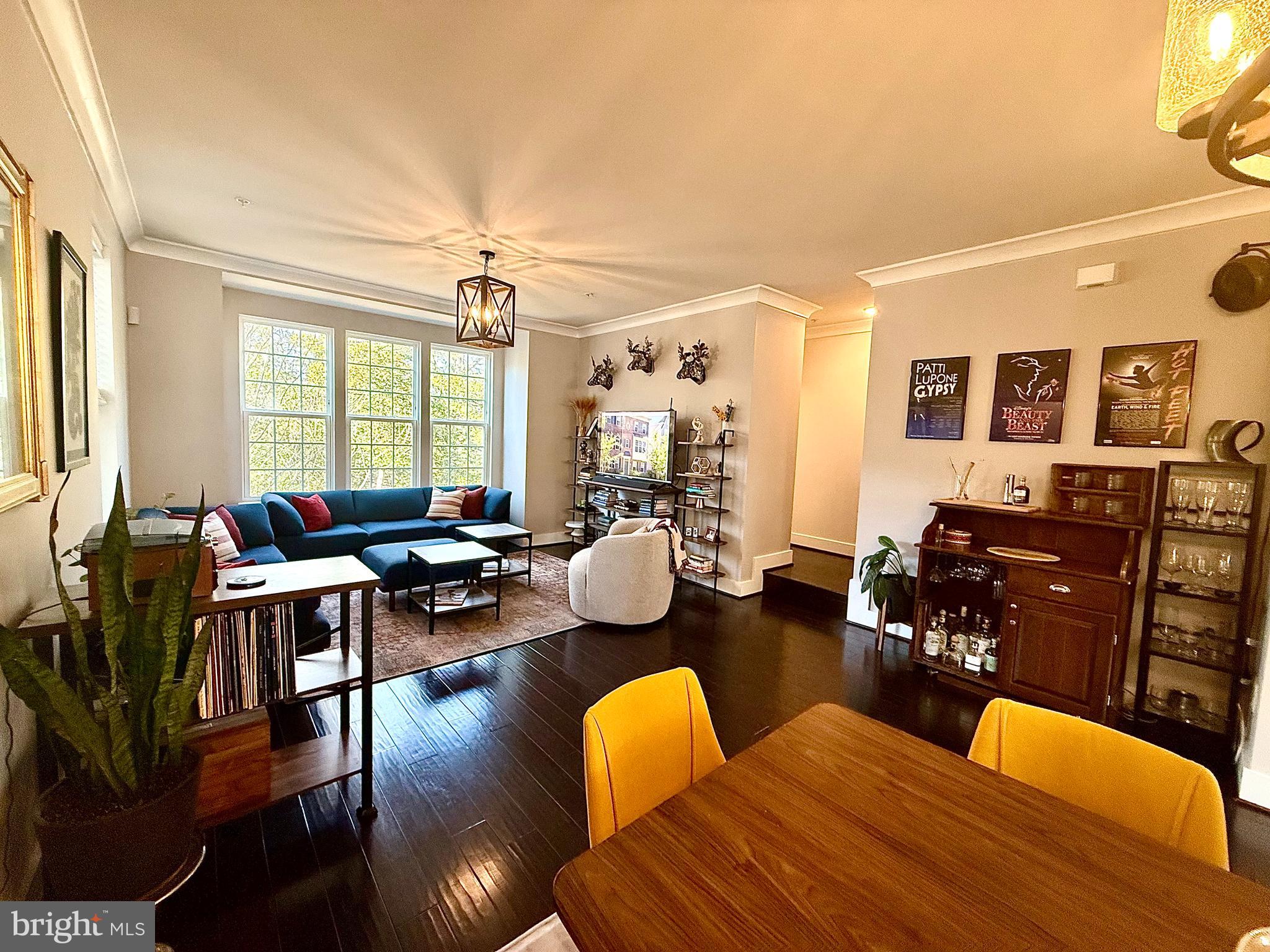 120 Waterline Court Annapolis, MD 21401 - Photo 14 of 38 a living room with furniture kitchen view and a large window