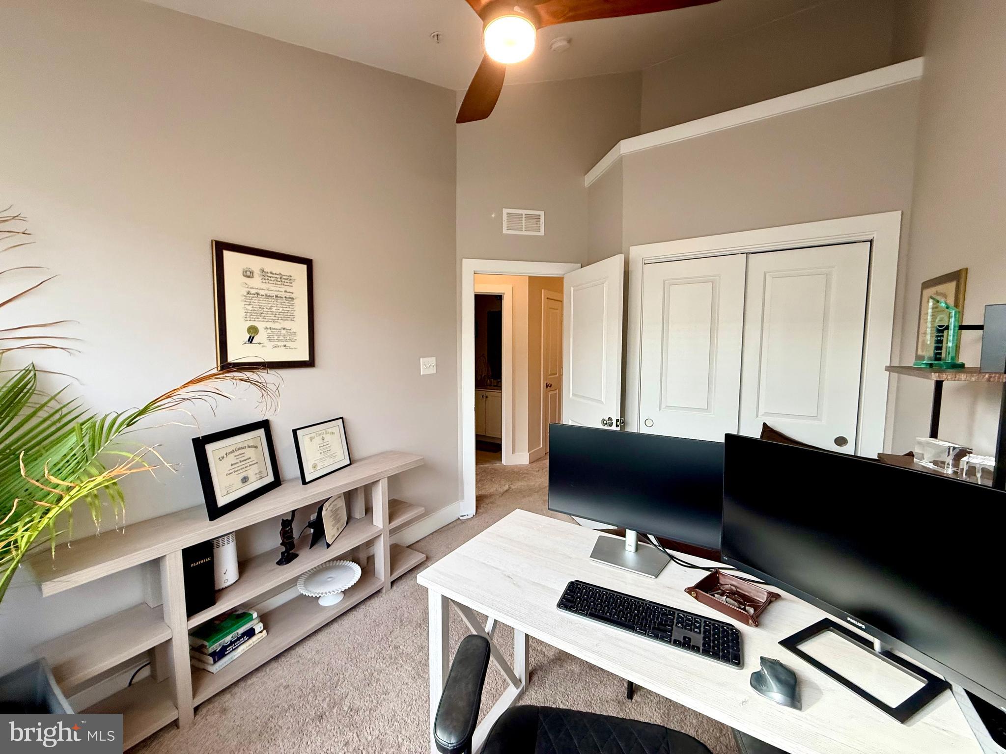 120 Waterline Court Annapolis, MD 21401 - Photo 25 of 38 a view of a workspace with furniture and a window