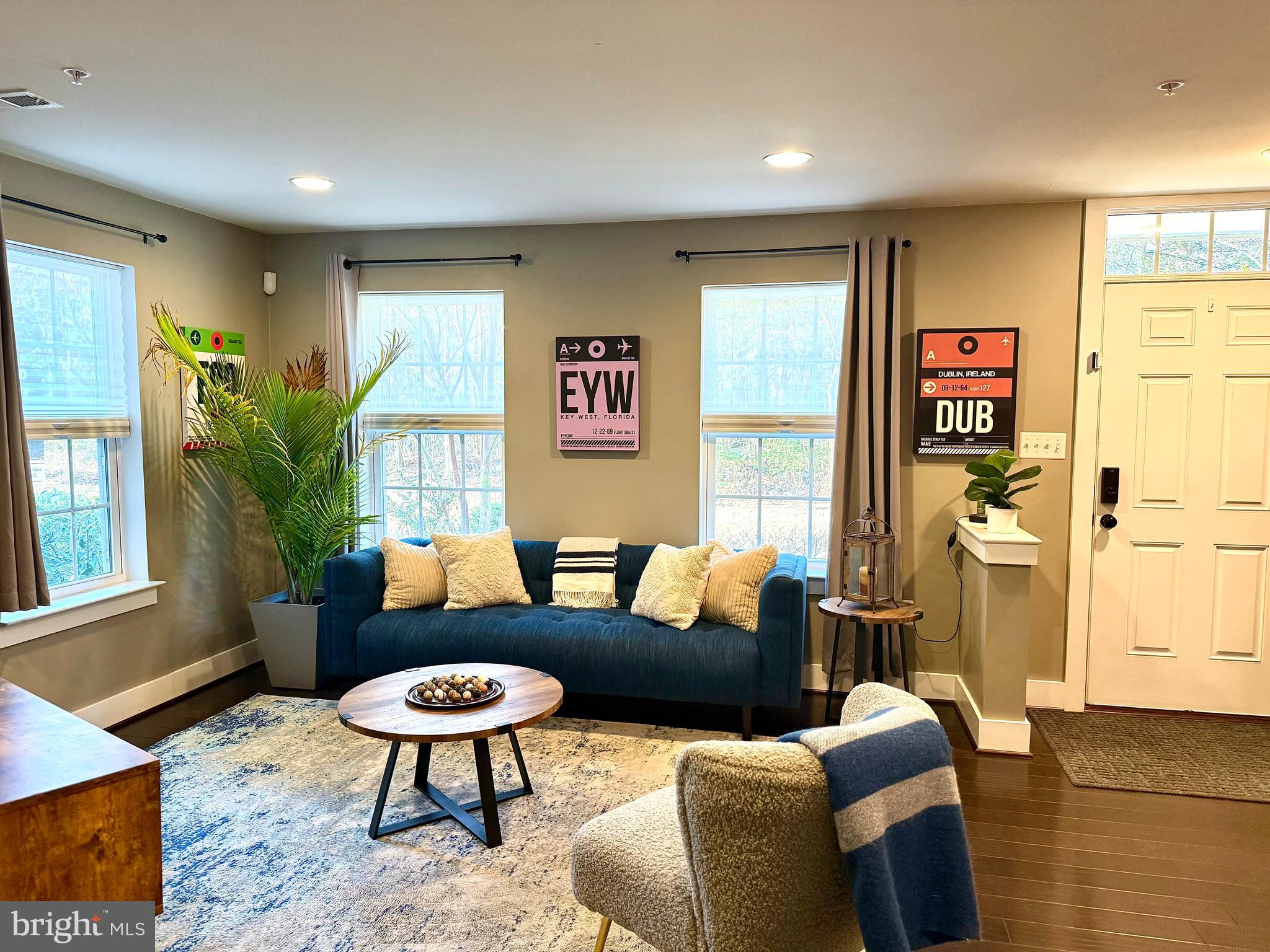 120 Waterline Court Annapolis, MD 21401 - Photo 4 of 38 a living room with furniture a rug and a large window