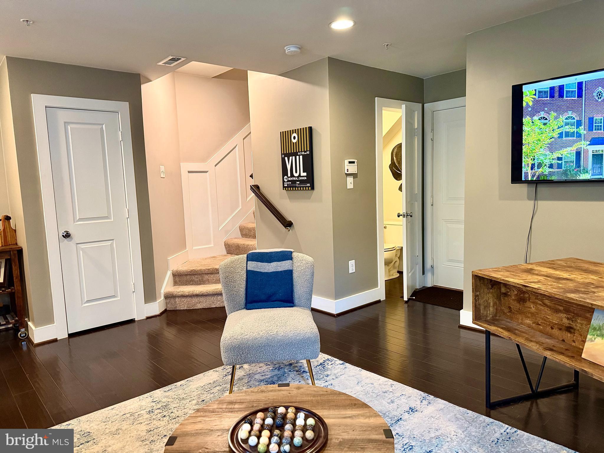 120 Waterline Court Annapolis, MD 21401 - Photo 5 of 38 a living room with furniture and a wooden floor