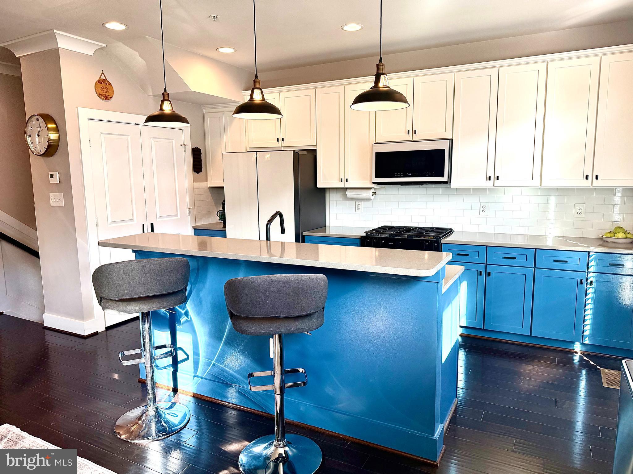 120 Waterline Court Annapolis, MD 21401 - Photo 10 of 38 a kitchen with stainless steel appliances granite countertop a stove a sink and a refrigerator