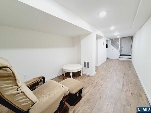 144 Valley Road Haworth, NJ 07641 - Photo 12 of 14 a bedroom with a bed and wooden floor