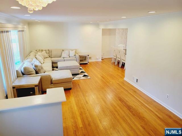 144 Valley Road Haworth, NJ 07641 - Photo 2 of 14 a bedroom with a bed and a couch