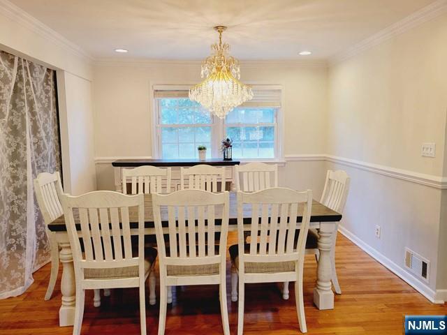 144 Valley Road Haworth, NJ 07641 - Photo 4 of 14 a view of a bedroom with wooden floor