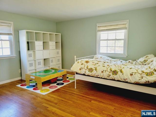 144 Valley Road Haworth, NJ 07641 - Photo 10 of 14 a bedroom with a bed and a window