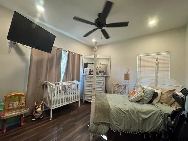 a view of a dining room with furniture wooden floor and chandelier