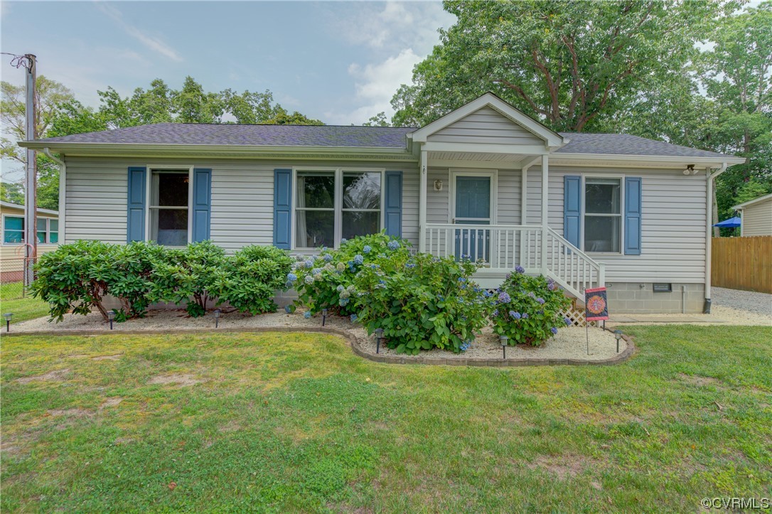 front view of a house with a yard