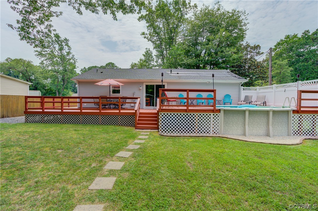 382 Hideaway Point Road Topping, VA 23169 - Photo 19 of 50 a view of a house with a yard porch and sitting area